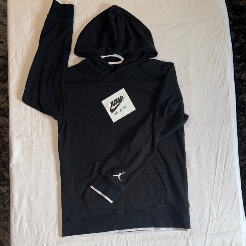 Nike Jordan Black hoodie with bold logo on front and sleeve.